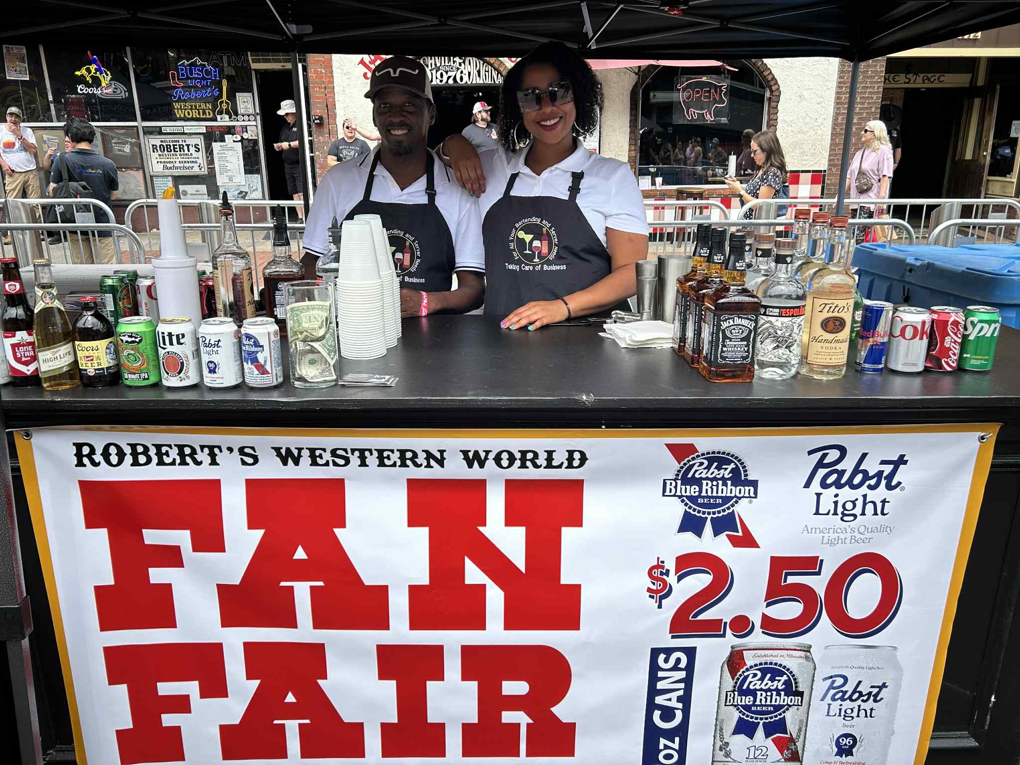 female and male bartender at corporate event