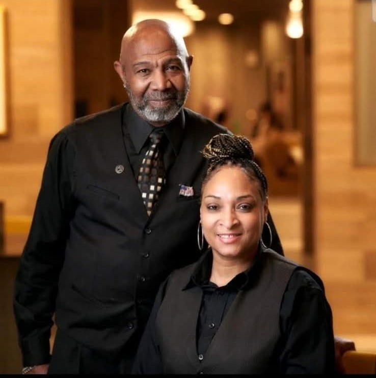 male and female bartenders and service staff