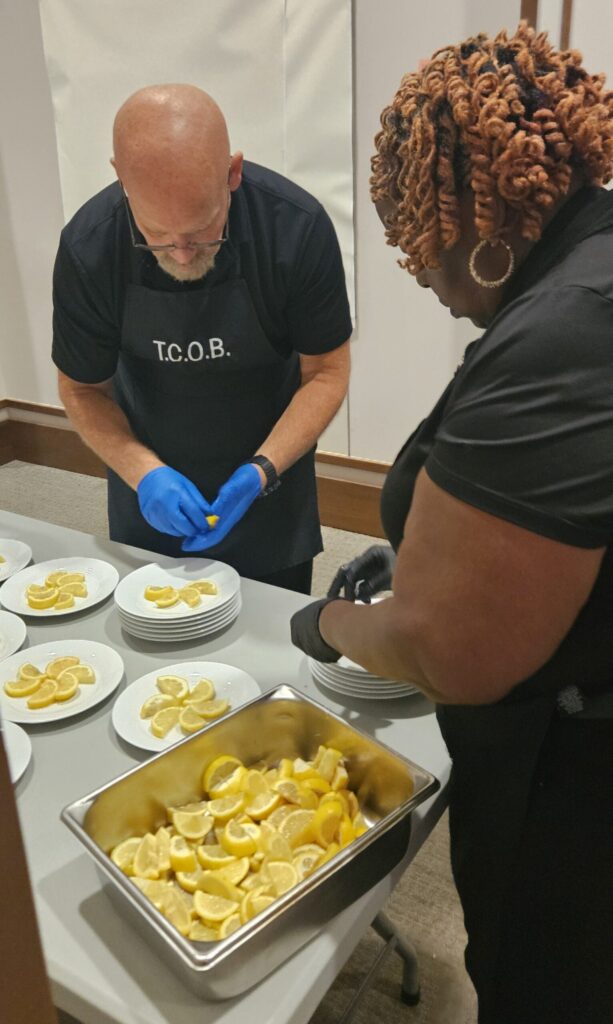 event staff preparing food