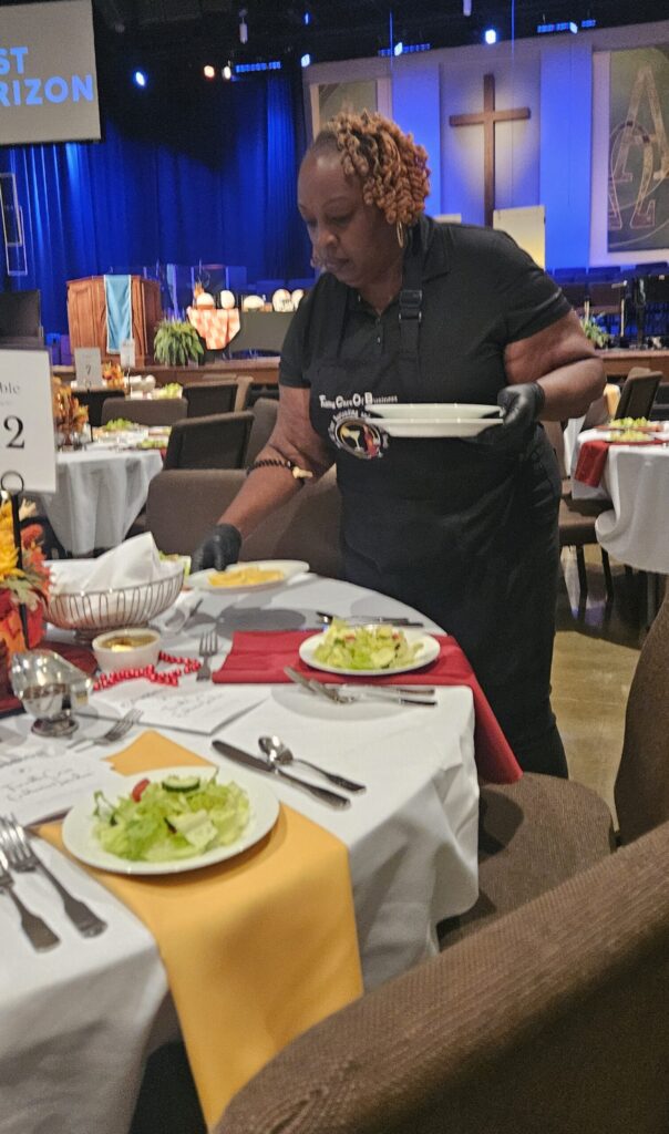 event staff clearing plates Nashville