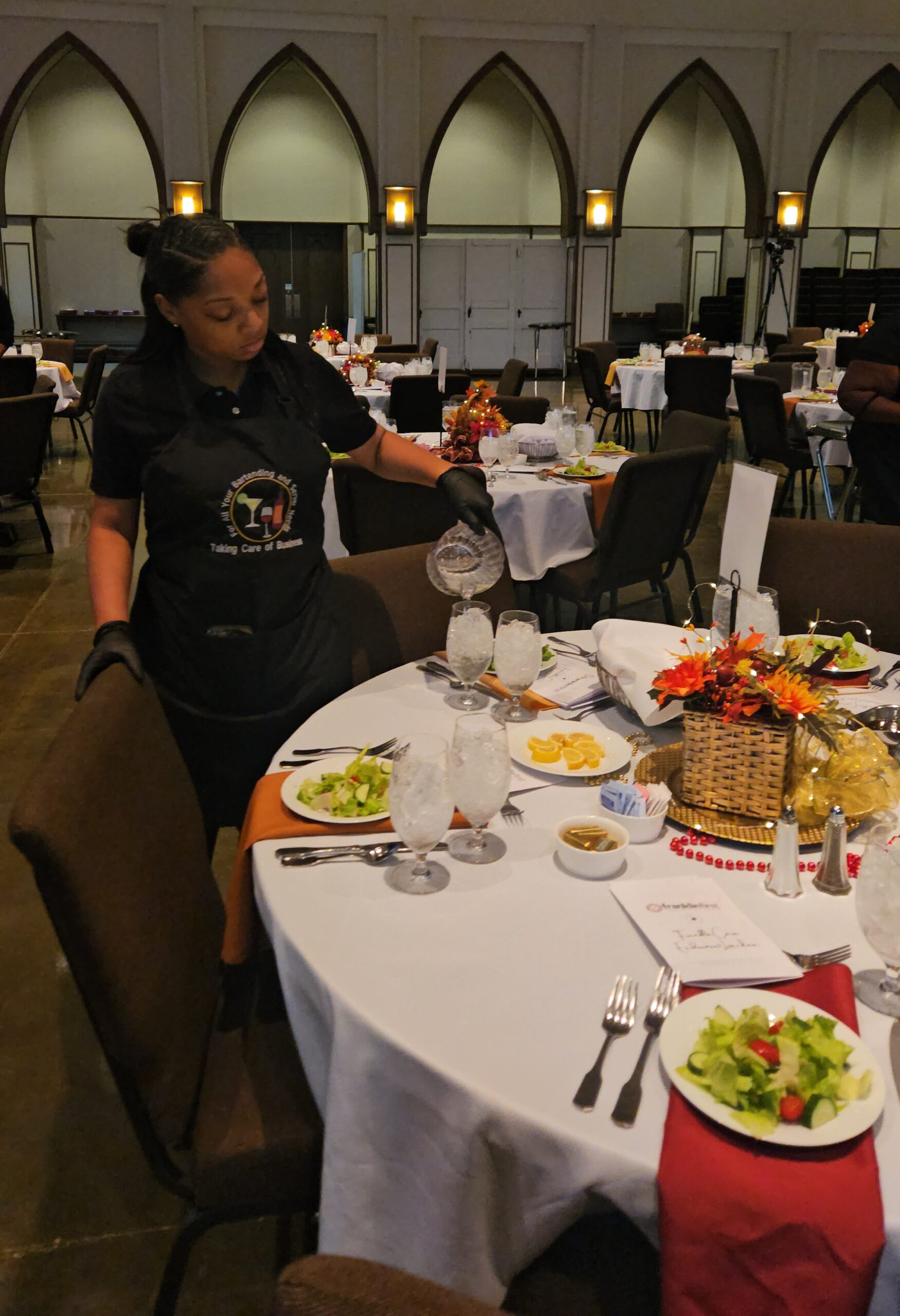 event staff serving dinner