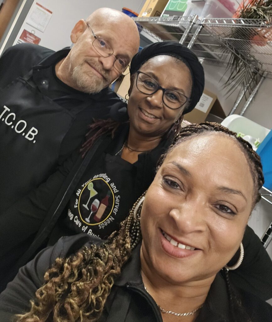 event staff working in kitchen